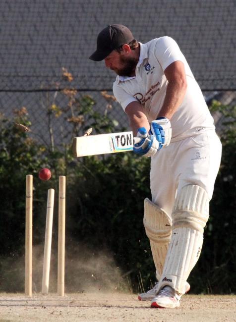 Danny Caine is bowled by Brad McDermott-Jenkins